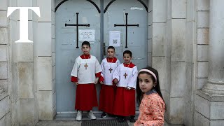 Palestinian Christians attend Christmas Eve Mass in Gaza City