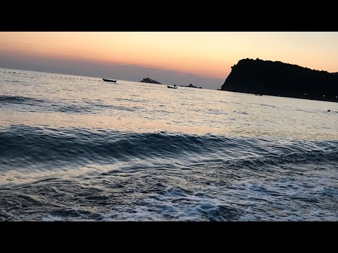 Beautiful sunset view at Buljarica beach in Montenegro filled with relaxing sounds of the sea.