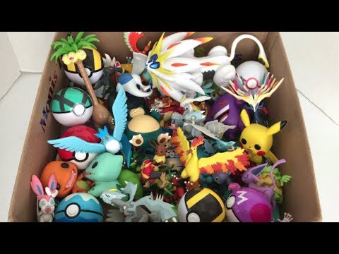 Box of Pokemon Figures Moltres White Kyurem Articuno Pyroar Alolan Exeggutor Snorlax Litleo