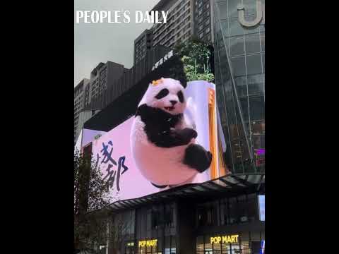 A playful and lifelike GiantPanda displayed on a naked-eye 3D screen in Chengdu