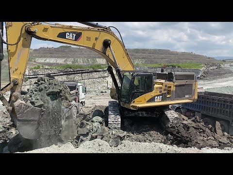 Caterpillar 365C Excavator Loading Overburden On Mercedes & MAN 4 Axle Trucks