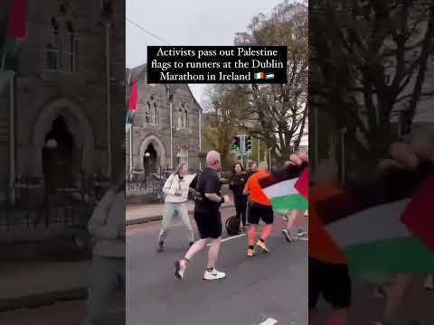 Flags handed to runners in dublin marathon ❤️