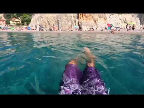 Swimming in the sea, summer vacation in Italy