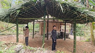 Homeless boy and poor girl complete the kitchen roof - Homeless boy