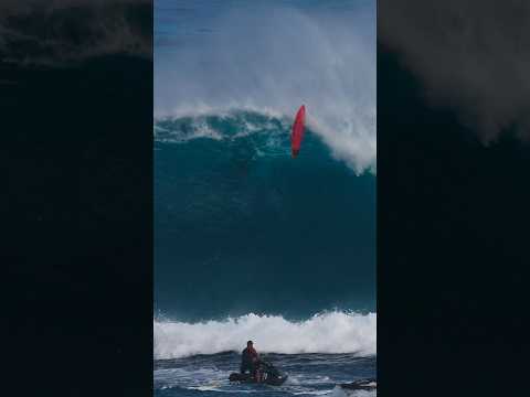 JETSKIS RACE TO GRAB SURFERS FROM GIANT WAVE