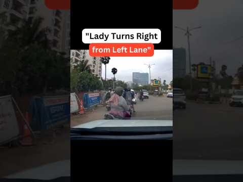 "Lady Takes Right Turn from Extreme Left! 🚗💥 Be proof-ready with Woodman Dashcam. Buy now! 🎥"