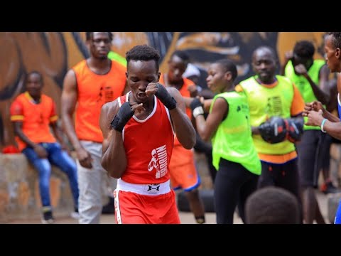 MEET COACH MUSA Kajoba Mpindi A Man With 12 Kids, 9 Girls In Uganda's Combat Sports. #MpindiFamily