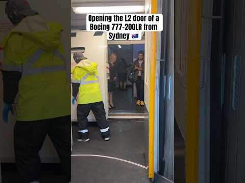 Opening the L2 door of a Boeing 777-200LR from Sydney 🇦🇺 #aviation #travel #boeing #doors