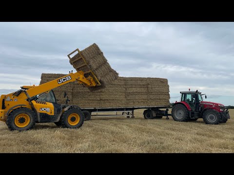 Rush to beat the rain ,collecting carting square bales of straw 2023