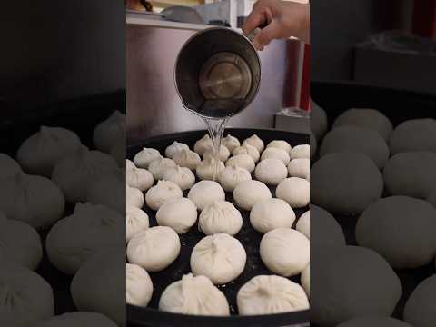 Must-Try Giant Rotating Griddle Dumplings