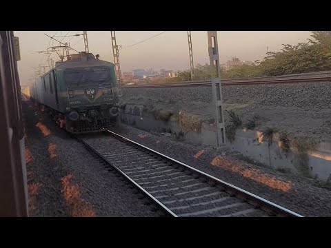 WAG-9 With Freight Train Crossing With Karnavati Express