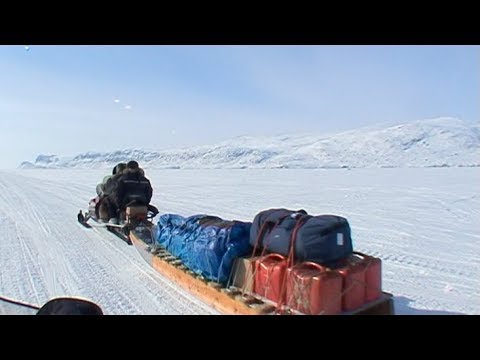 Snowmobile departure from Pangnirtung towards Penny icecap - Penny Icecap 2009 expedition