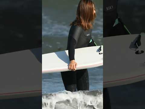 A beautiful surfer found at the beach.