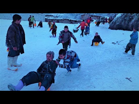 skating of Nuristani kids using oil drums