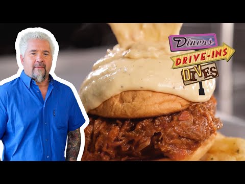 Guy Fieri Digs Into Beer Cheese SMOTHERED Sloppy Joe | Diners, Drive-Ins and Dives | Food Network