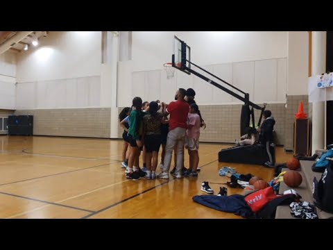 Basketball practice boys & girls workin hard on shooting, dribbling, passing, lay-ups ,ball control