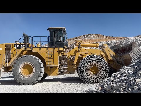 Caterpillar 992K Wheel Loader Loading On Aggregates Quarry Caterpillar 777F Dumpers - Interkat SA