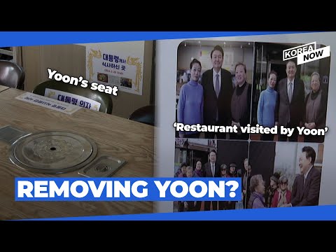 Businesses taking down Yoon's photos and autographs, as they fear sales drop