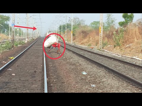 11039- Maharashtra Express With Wap-7 Horning On Man On Track.