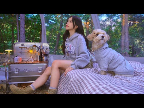 deep mountain transparent tent surrounded by wood | smoked chicken legs | puppy and couple look