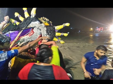 Maa Durga in the flooded river/ बाढ़ नदी में माँ दुर्गा को त्याग दिया