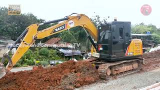 MINI EXCAVATOR SANY SY75 START DIGGING DIRT ON ROAD CONSTRUCTION