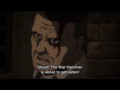 Eren tries to eat the war hammer titan