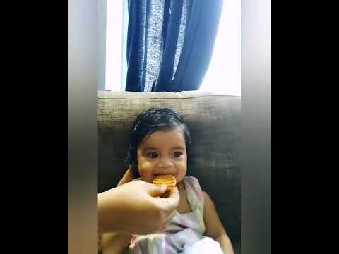 cute baby reaction after tasting biscuit  ❤️😘