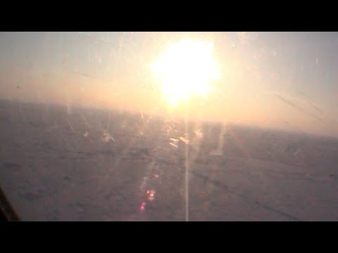 Takeoff of the helicopter of the Barneo base - Geographic North Pole 2002 expedition