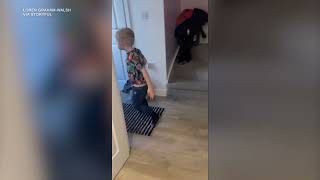 Kid Completely Freaks Out When Grinch Arrives at His Door