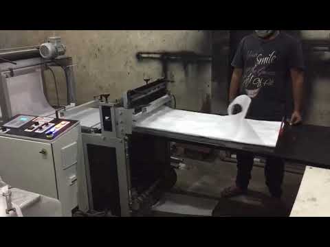 disposable plastic apron cutting machine//Plastech Engineers//Bhavyat Patel 9638503100