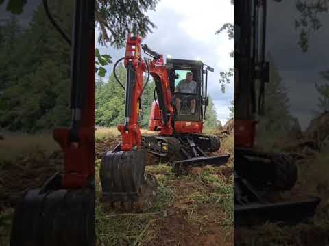 Moving rocks with the ku45 chinese excavator