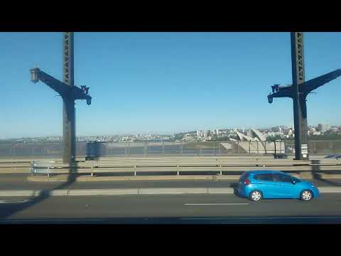 Crossing Sydney Harbour Bridge by train.