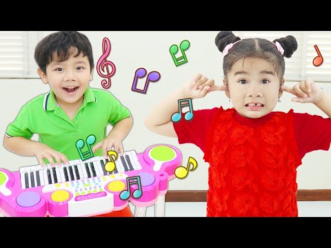 Annie & Suri Play Music Toys In Contest