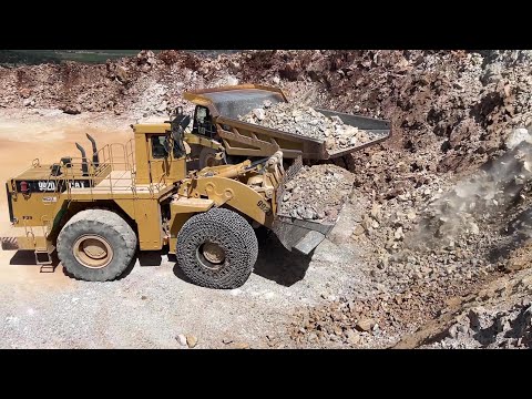 Caterpillar 992C Wheel Loader Loading Caterpillar 777F Dumpers On Aggregate Quarry - Interkat SA