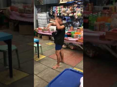 Unleashing his special moves while waiting for a customer #vendor #market #dancing #youtubeshorts