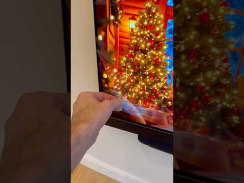 Watch as we peel the protective film off this brand-new TV - nothing beats that fresh screen reveal.