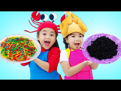 Suri and Annie Playing with Colorful PlayDoh Noodles