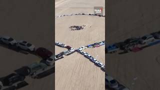 Israel-Hamas: Drone video shows 100 vehicles form ribbon to urge hostage deal