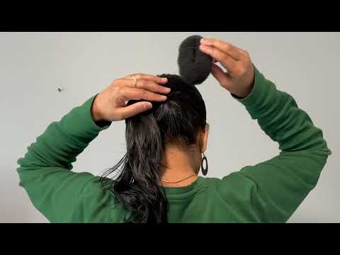 "Graceful Twist: The Sleek Juda Bun hairstyle "  #hair #hairstyle #hairstyles