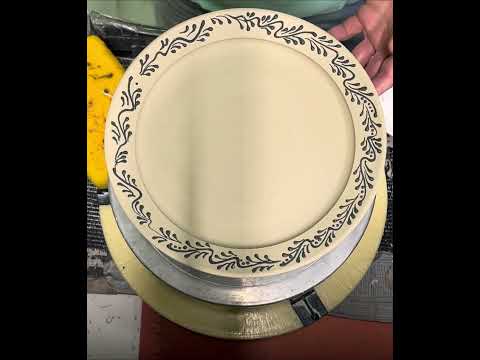 Slip Trailing a wheel thrown pottery plate rim free hand. (Sound on for detailed explanation)