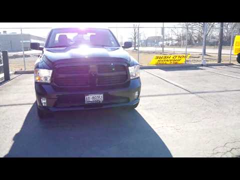 2016 RAM WITH 20 INCH BLACK & MILLED OFF ROAD RIMS