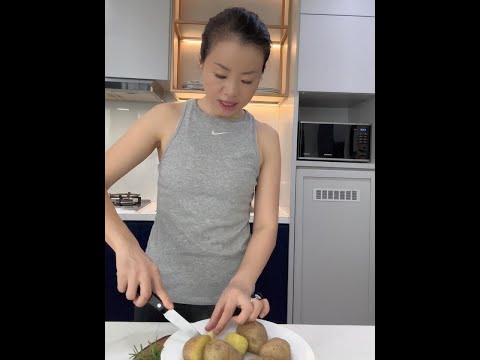 Potatoes rich in iron  tasty. Kids grab a huge plate for a million dou photo.