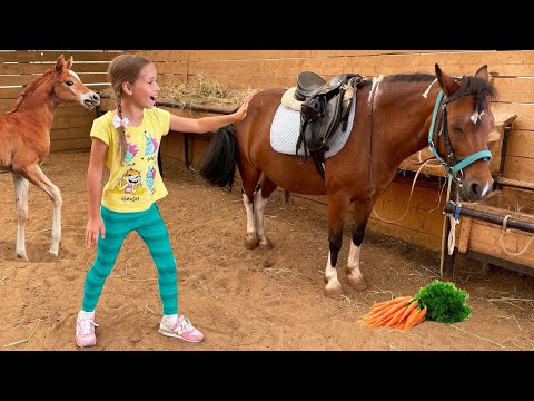 Sofia and Max play with Daddy at the farm and feed the animals