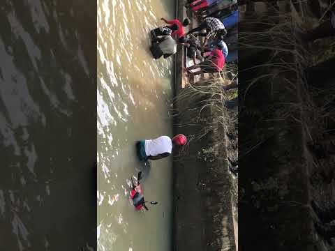 Bike accident two bodies got from water