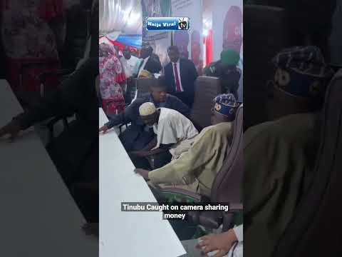 Tinubu caught on camera sharing money