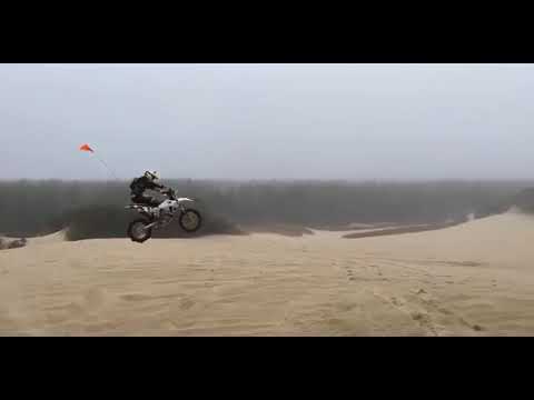 Boy Wonder Dune Jumping his Husky FX 350