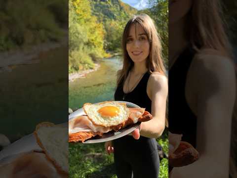 Cozy breakfast alone in my solo camp by the river - made from leftovers and an egg fried in a spoon