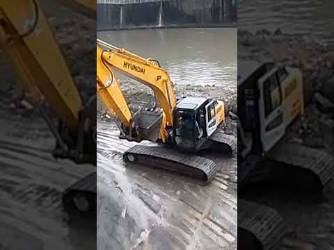 komatsu working on a river normalization