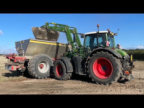 Spreading lime loading and spreading.